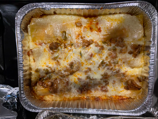 Why should you not cover lasagna in a metal pan with foil?